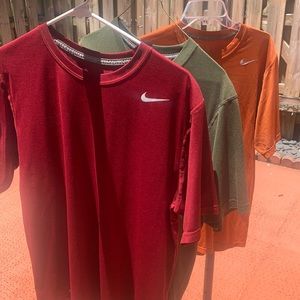 Men’s Dri-Fit Nike workout shirts.
